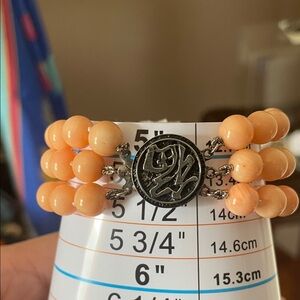 Beaded Triple-Strand Bracelet with  .925 stamped Silver Medallion